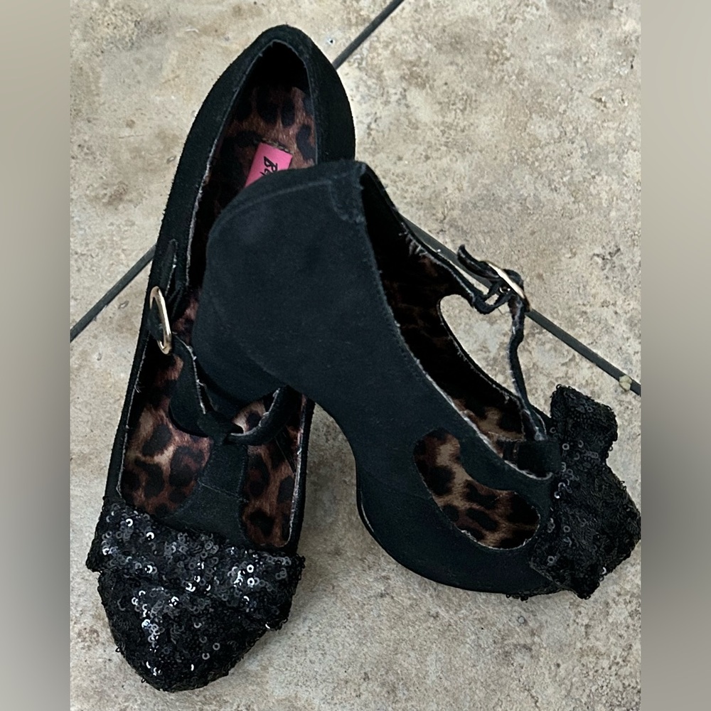 Betsey Johnson black heels accented with leopard print and sequined bows.